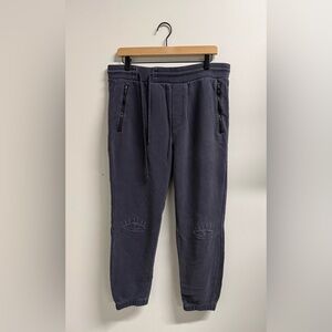 Hurley x Stink collab joggers with embroidered  eye logo on knees